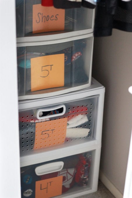 hand-me-downs stored in the back of a closet