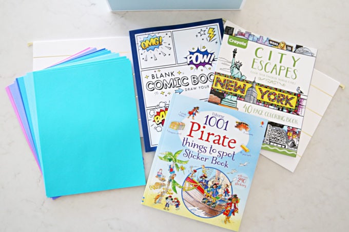 Coloring Books and Papers in an Organized Kids' Art Station, This simple portable, organized kids' art station makes it easy for kids to be creative anywhere in the house! | #artstation #artsupplies #organizedkids #organization #organized #organizedwithkids