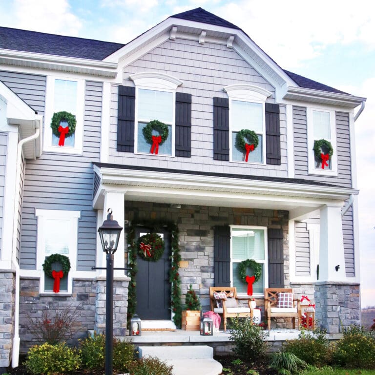 Craftsman Style House with Pretty Christmas Wreaths on the Windows, Learn How to Hang them the Easy Way