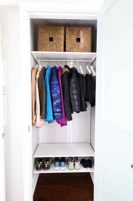 Organized Coat Closet in a Mudroom Entryway