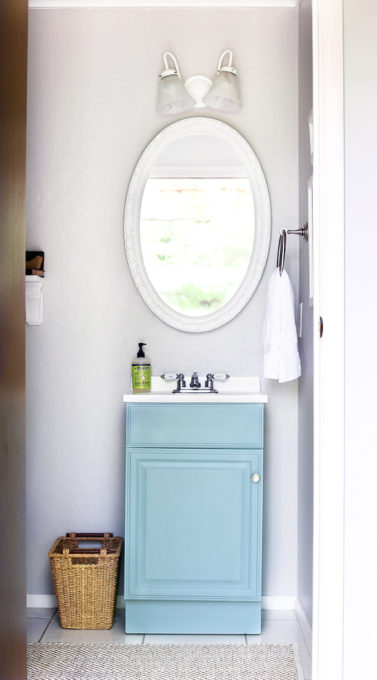 Aqua paint colors can be tough to sort through to find the perfect blend of blue and green for your space, so I'm sharing my 10 favorite aqua paint colors that will make any room feel soothing and serene! | #aqua #aquapaintcolors #aquapaint #mintpaint #mintpaintcolors #paintcolors #bestpaintcolors , Half Bathroom Vanity in Behr Clear Pond