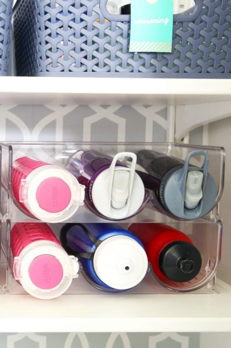 Water bottles in a wine bottle holder