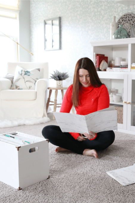 Woman sorting through paperwork